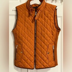 Beautiful burnt orange vest with gold accents. Size S.